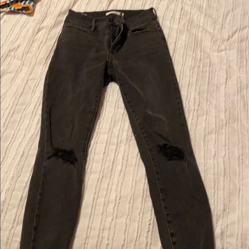 black ripped jeans